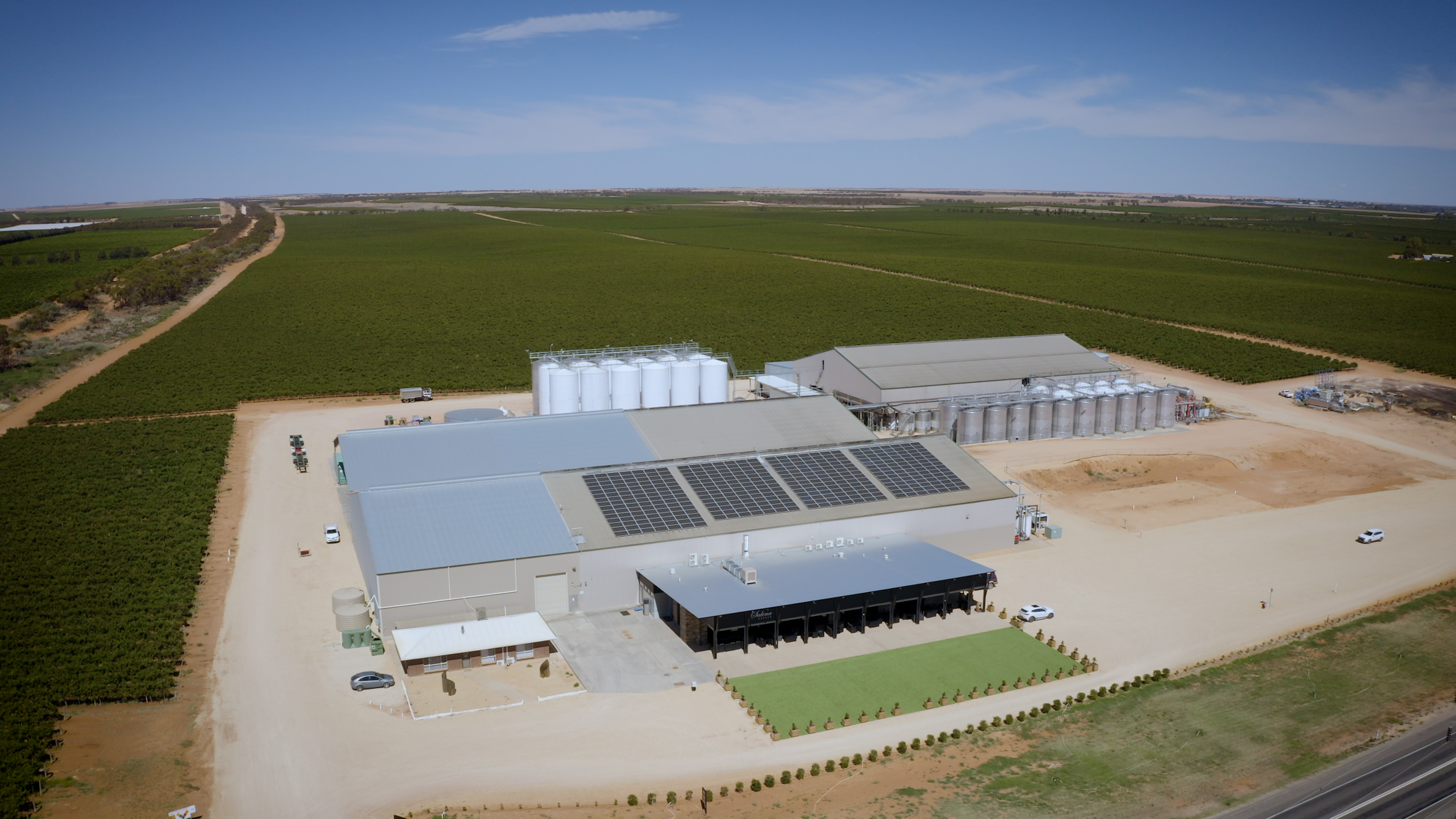 Aerial shot of winery compound and vineyard 